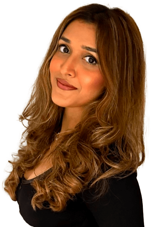 A woman with long brown hair posing for a photo.