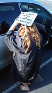 Christina Arredondo getting into a car with her gown and graduation cap