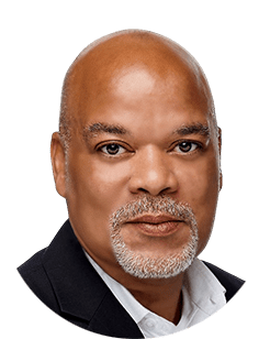 A portrait of a black man with a beard.