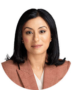 An image of a woman in a blazer.