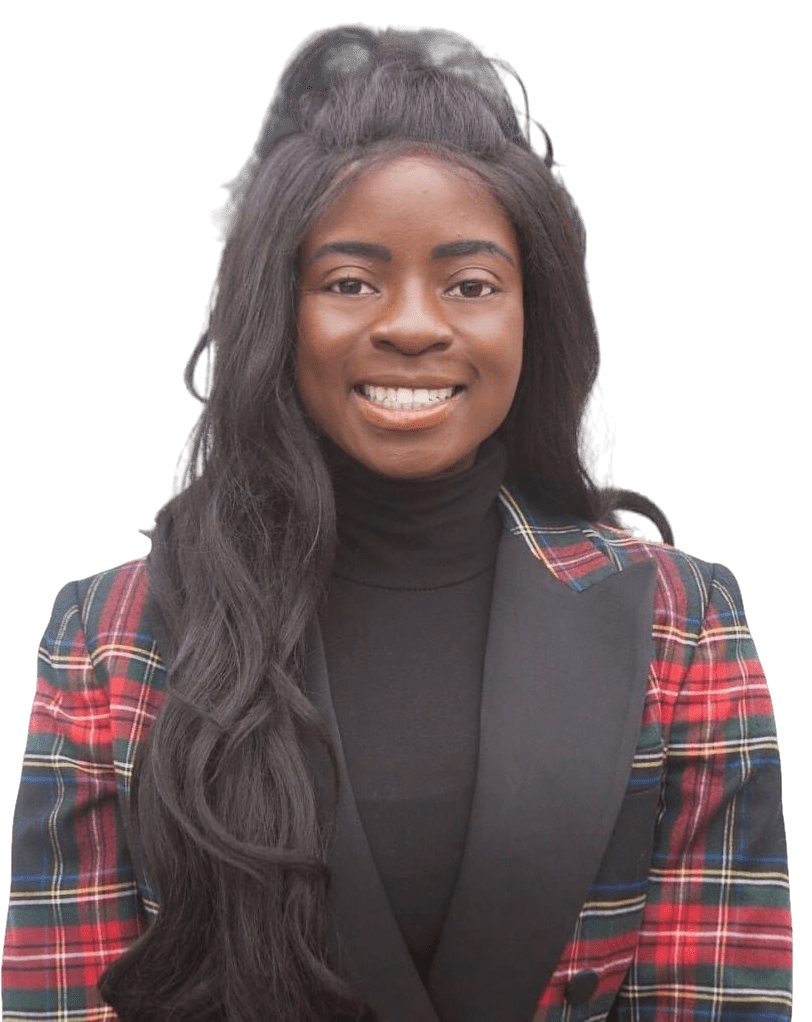 A person in a plaid jacket smiling.