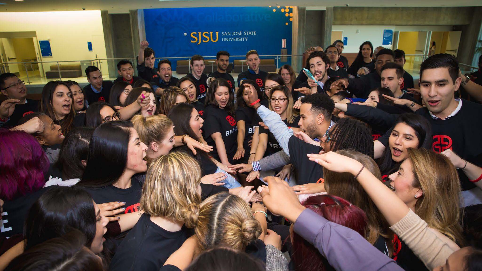 A group of people gathered in a room.