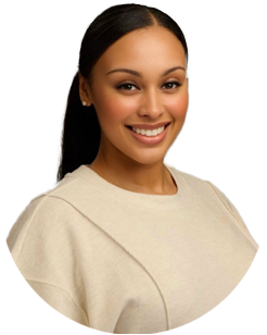 A woman with long dark hair tied back, wearing a beige top, smiles at the camera against a plain light background.